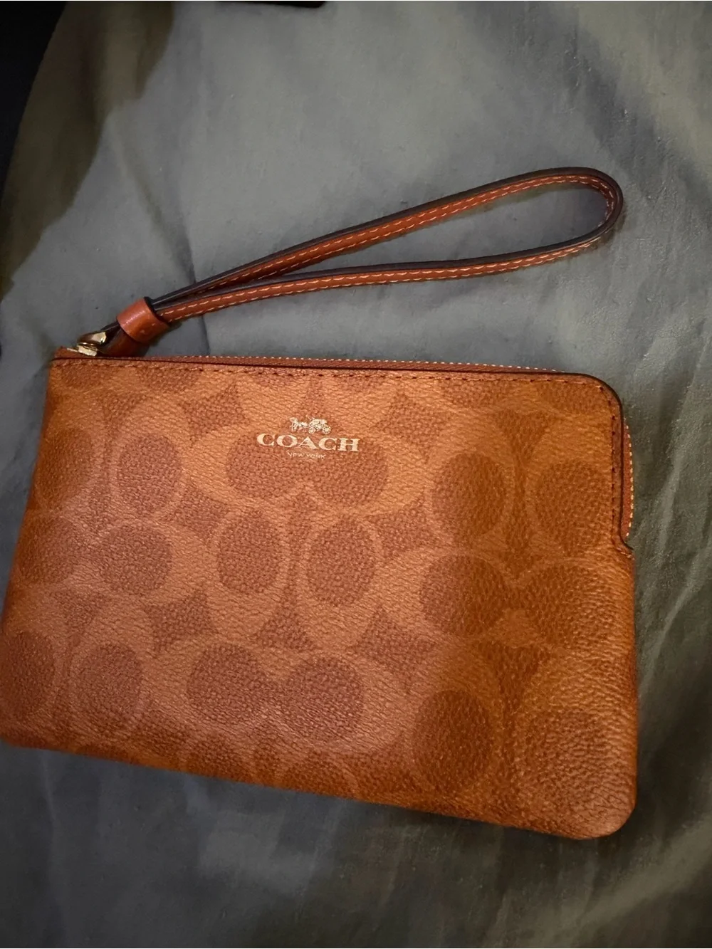 Coach Orange Leather Sling Bag with Black Strap and wristlet new without tags